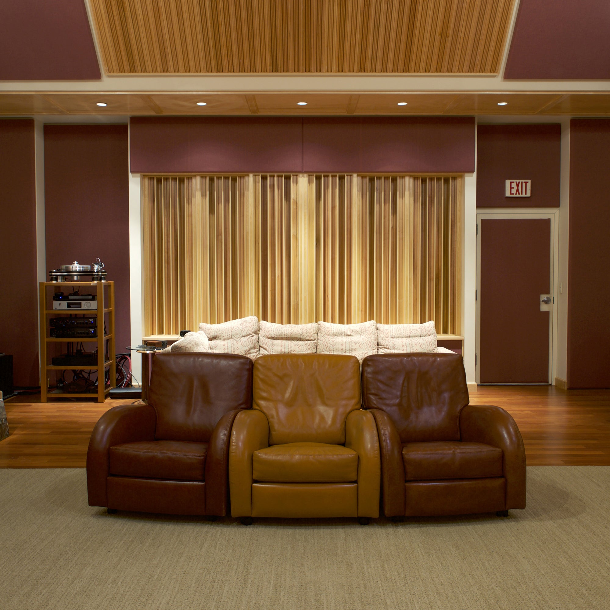 A living room with two leather recliners.
