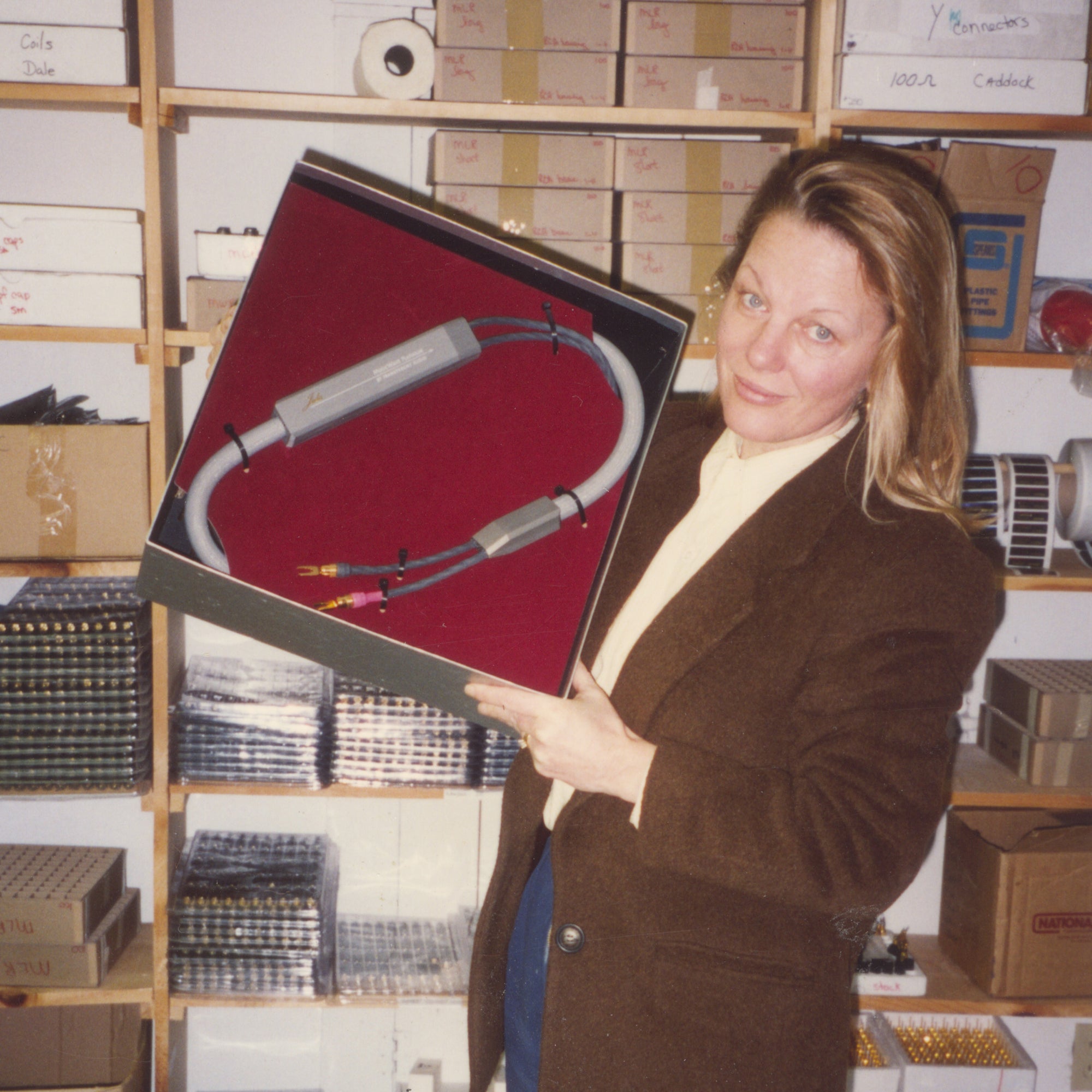 A woman holding a box.