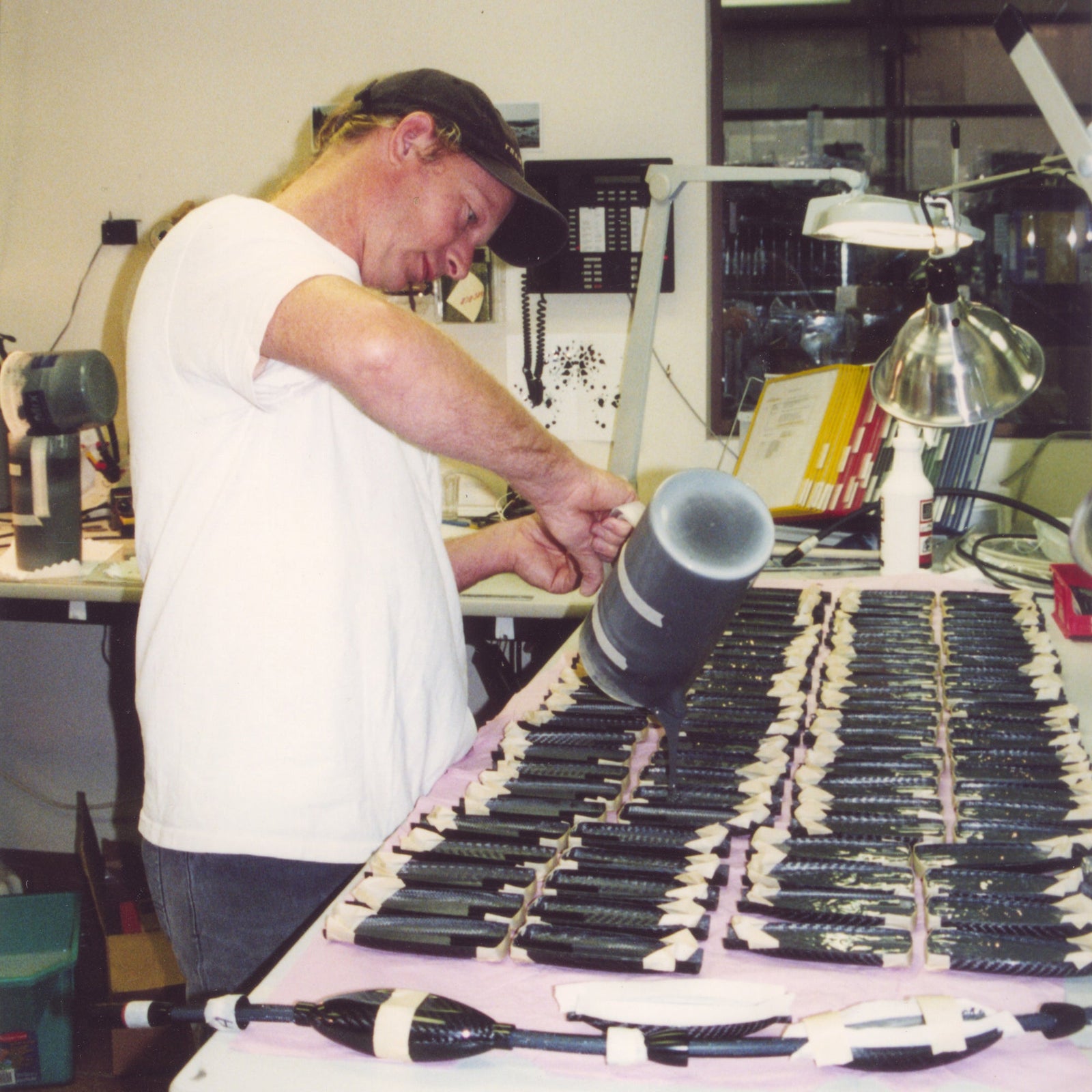 Man wearing a white t-shirt.