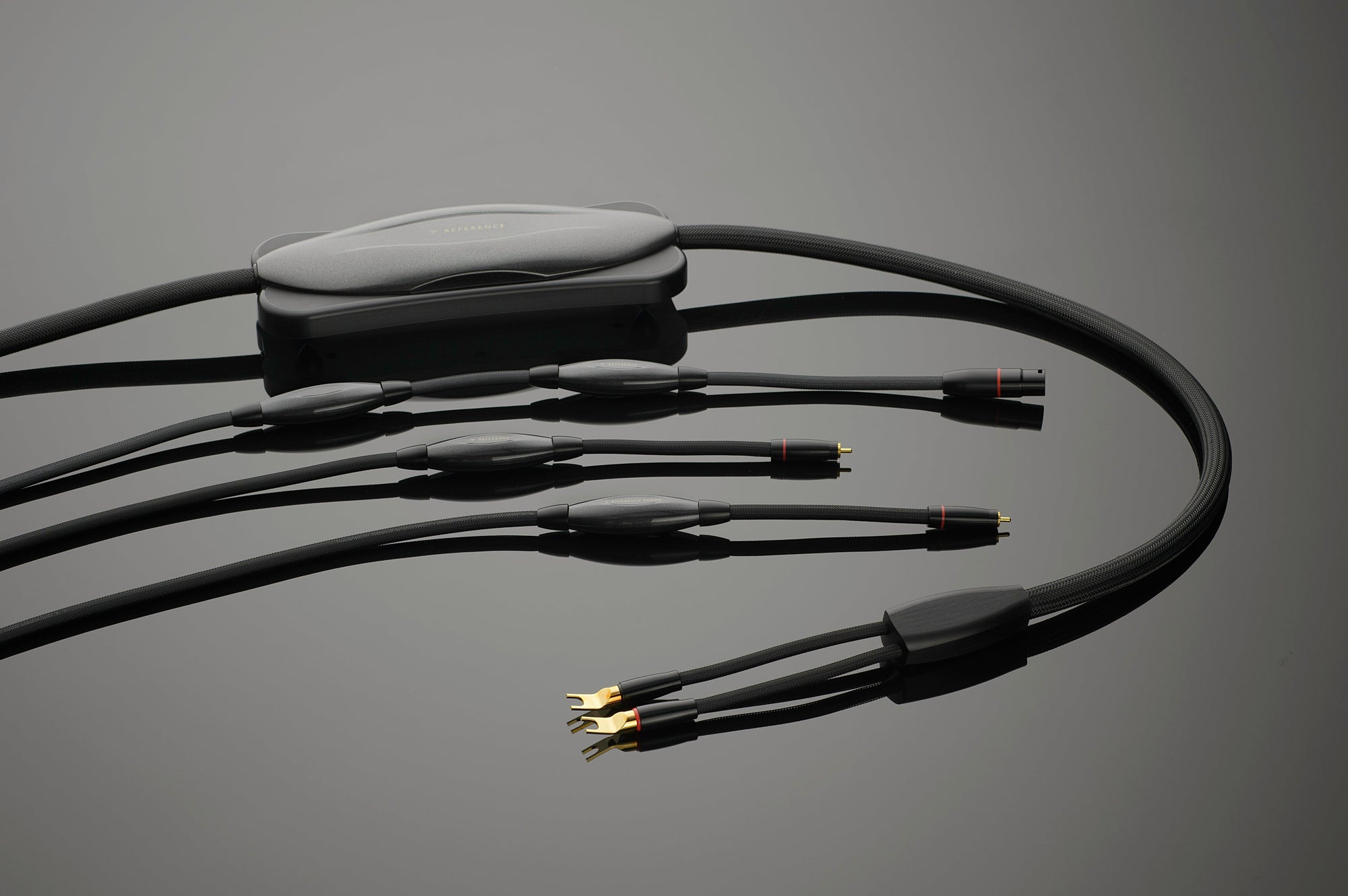 A black cable with four wires on it.