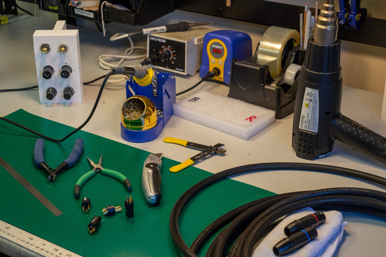 A table with a variety of tools on it.